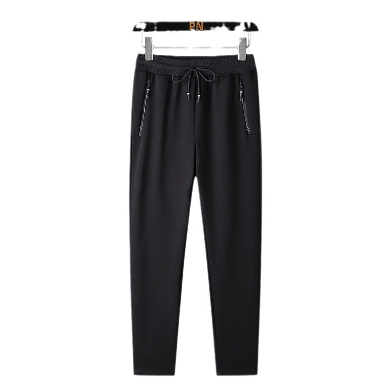 Men's thermo fleece jogging pants with brushed inner side, reflective zipper pockets and drawstring waistband Mune Fashion