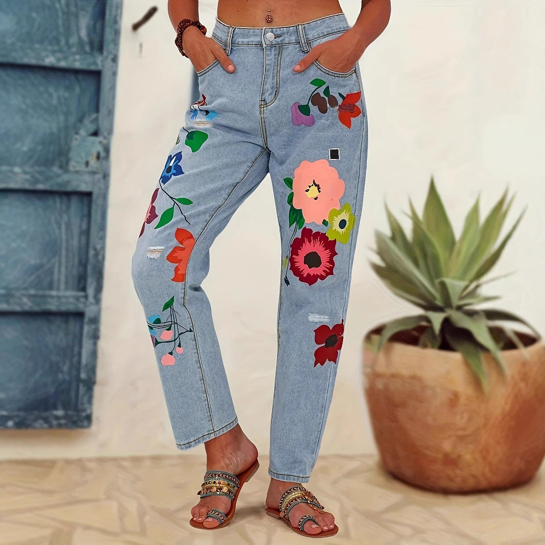 Ladies straight-cut jeans with colorful floral appliqués and light destruction details Mune Fashion