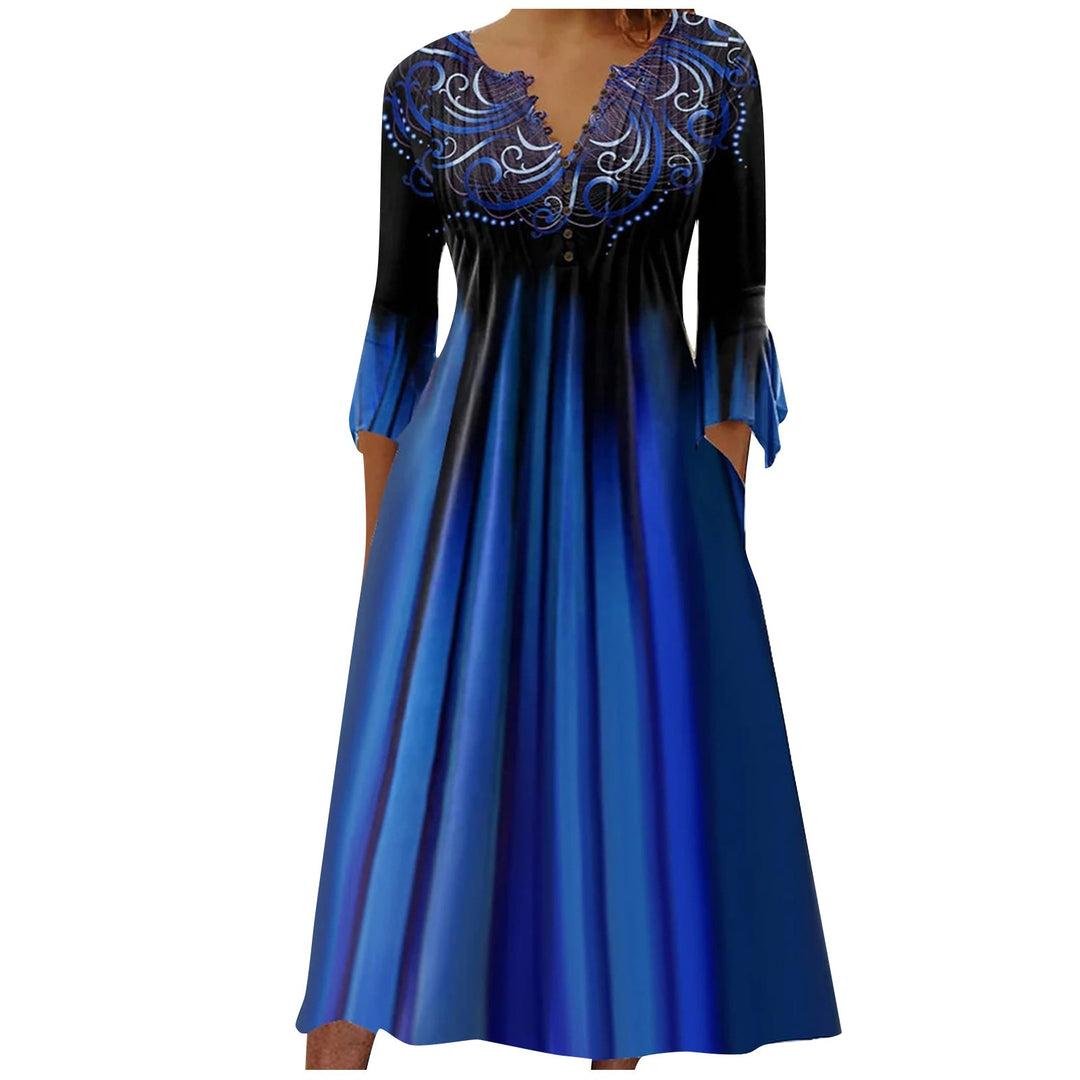 Women's flowing maxi dress with embellished V-neck, underbust seam, flared skirt and side pockets Mune Fashion