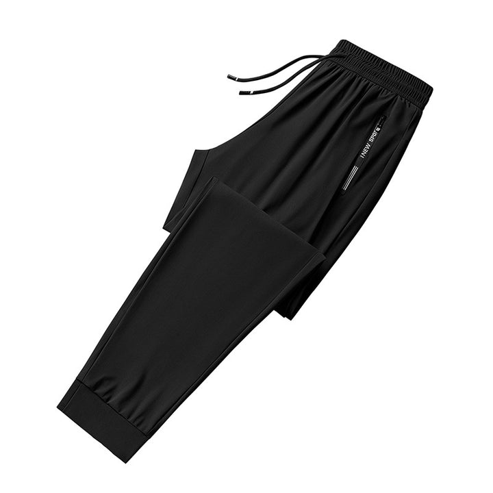 Men's sporty training pants with elastic waistband and practical side pockets Mune Fashion 1788242897