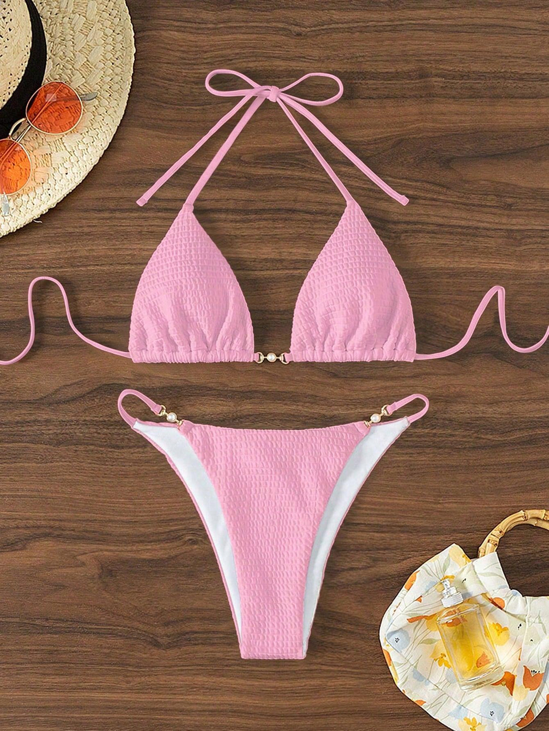 Women's Triangle Bikini with fashionable lacing details and elegant accents Mune Fashion