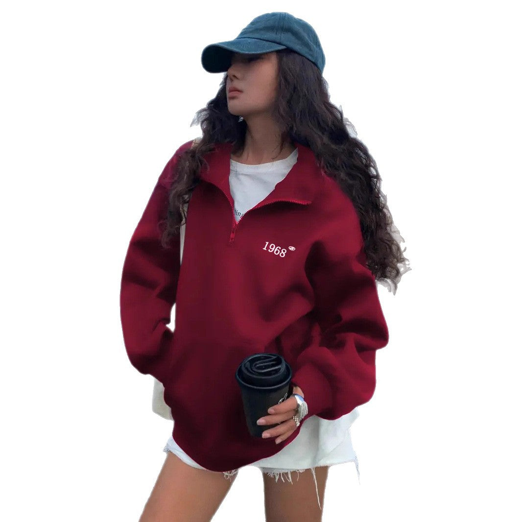 Women's oversized half-zip sweatshirt with high collar, kangaroo pocket, and casual oversized fit Mune Fashion