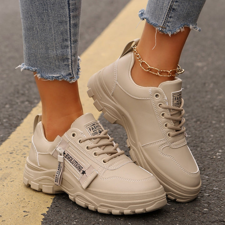 Women's Platform Chunky Sneaker with robust profile sole, zipper detail, and padded comfort footbed Mune Fashion