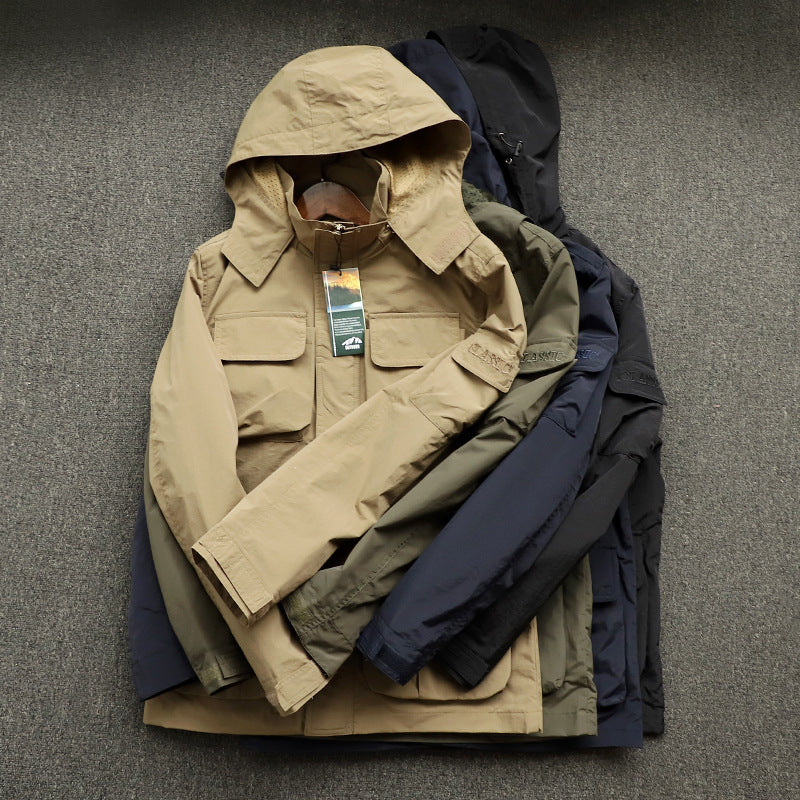 Men's urban field jacket with multiple pockets, wind-resistant surface and concealed hood Mune Fashion