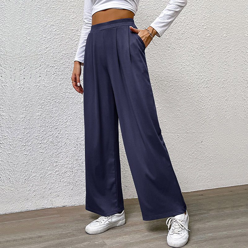 Ladies high-waisted wide trousers with front pleats, elastic waistband and side pockets Mune Fashion