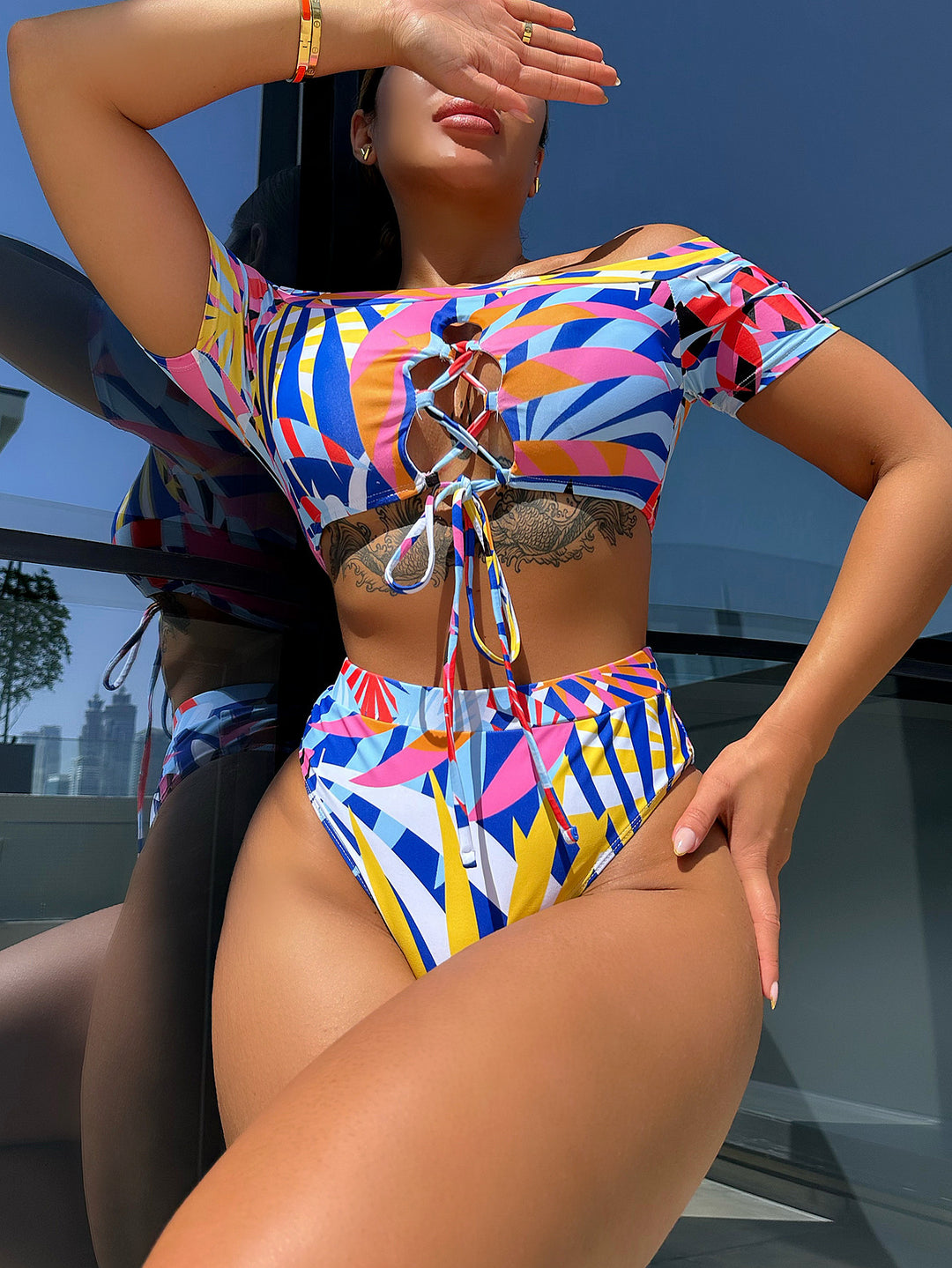 Women's fashionable bikini set with creative cut and colorful geometric design Mune Fashion
