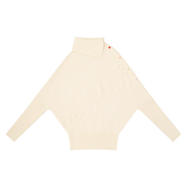 Women's oversized sweater with roll neck, asymmetric shoulder button placket and cable knit details Mune Fashion