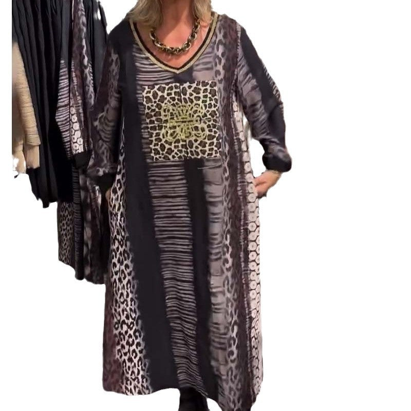 Ladies flowing panel long dress with patchwork animal print and gold-colored chest application Mune Fashion