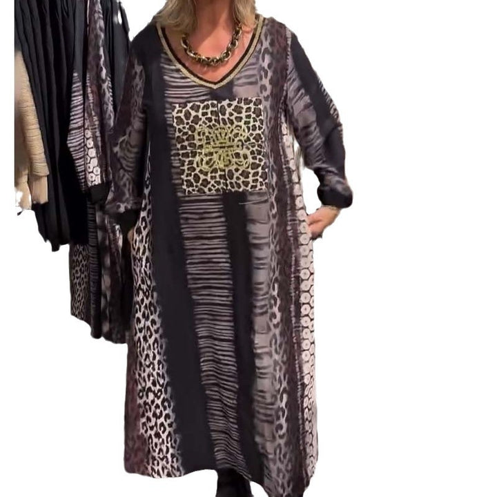 Ladies flowing panel long dress with patchwork animal print and gold-colored chest application Mune Fashion