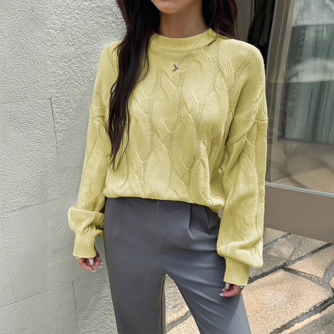 Women's cropped cable knit sweater with boxy silhouette, dropped shoulder, and ribbed hem Mune Fashion