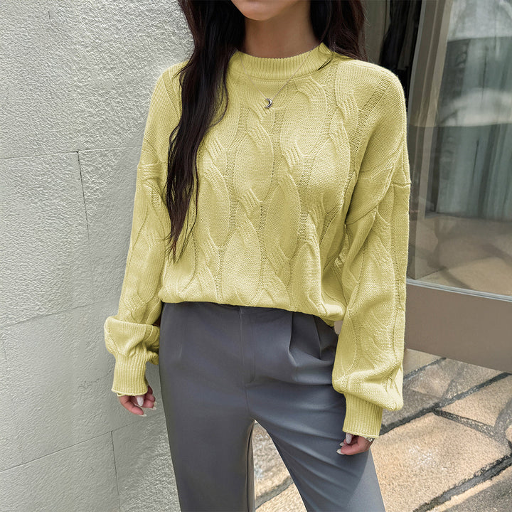 Women's cropped cable knit sweater with boxy silhouette, dropped shoulder, and ribbed hem Mune Fashion