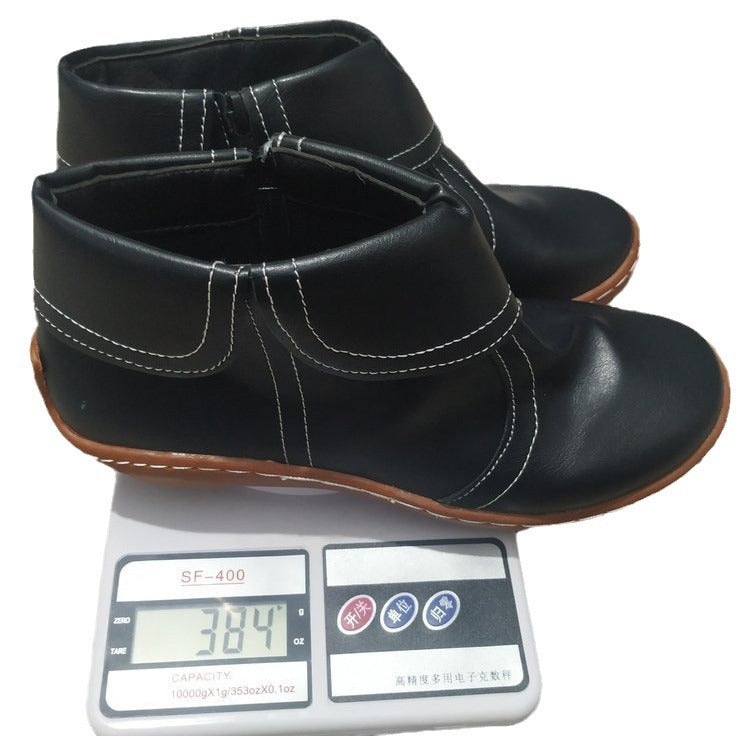 Women's soft leather booties with foldable strap, side zipper and flexible tread sole Mune Fashion