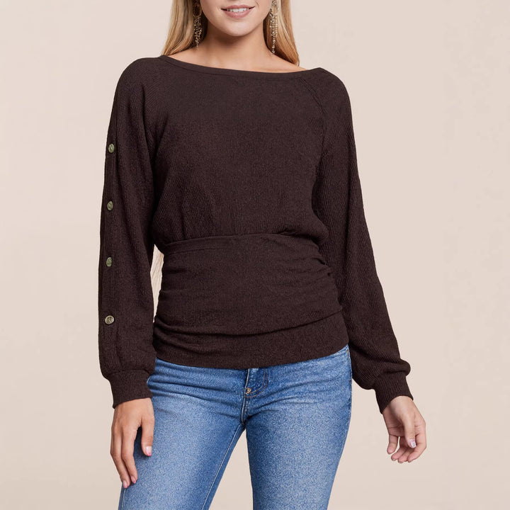 Women's fine knit sweater with wide boat neckline, sleeve button detail and fitted smock shape Mune Fashion