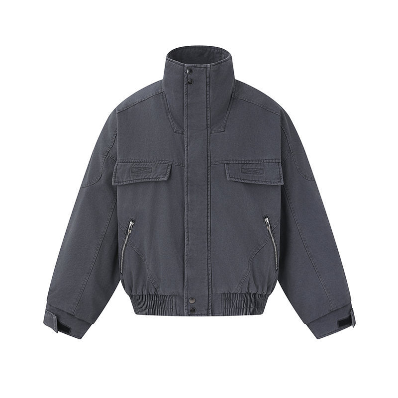 Men's short-cut canvas bomber jacket with high stand-up collar, concealed front placket, and zip pockets Mune Fashion