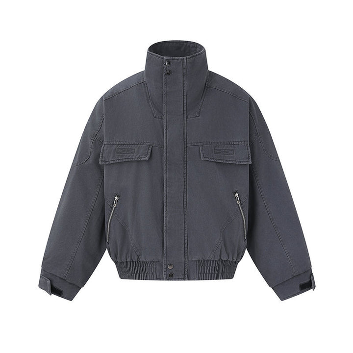 Men's short-cut canvas bomber jacket with high stand-up collar, concealed front placket, and zip pockets Mune Fashion