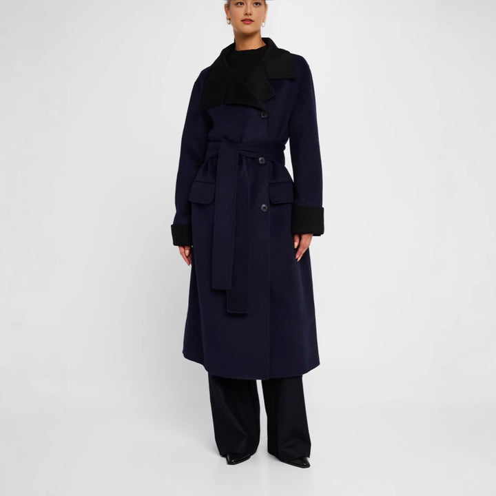 Women's tailored wool blend coat with tie belt, contrast lapel and flap pockets Mune Fashion