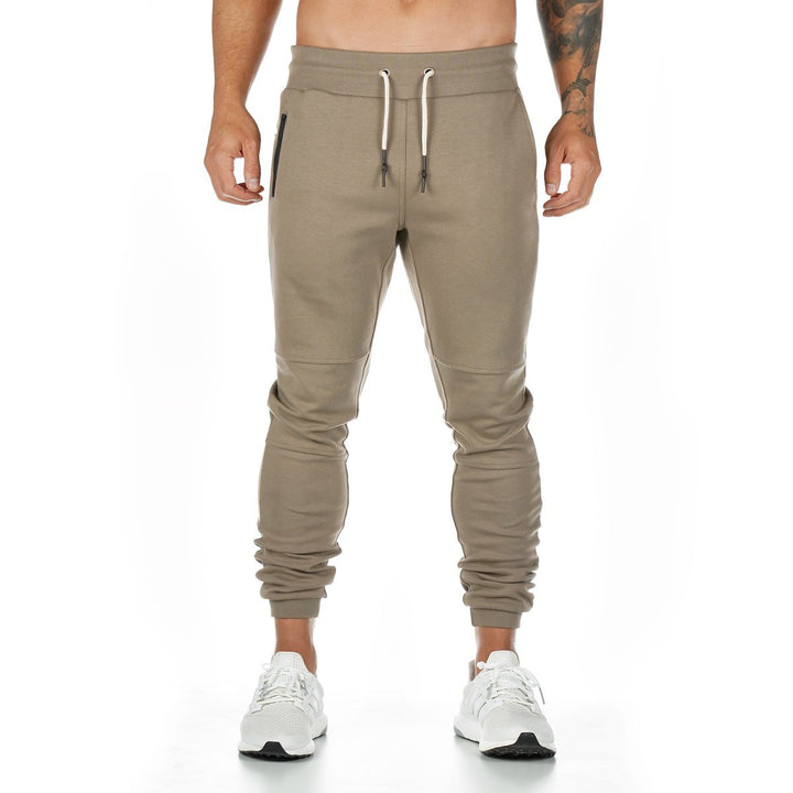 Men's narrow-cut joggers with ribbed waistband, zip pocket, and knee darts Mune Fashion