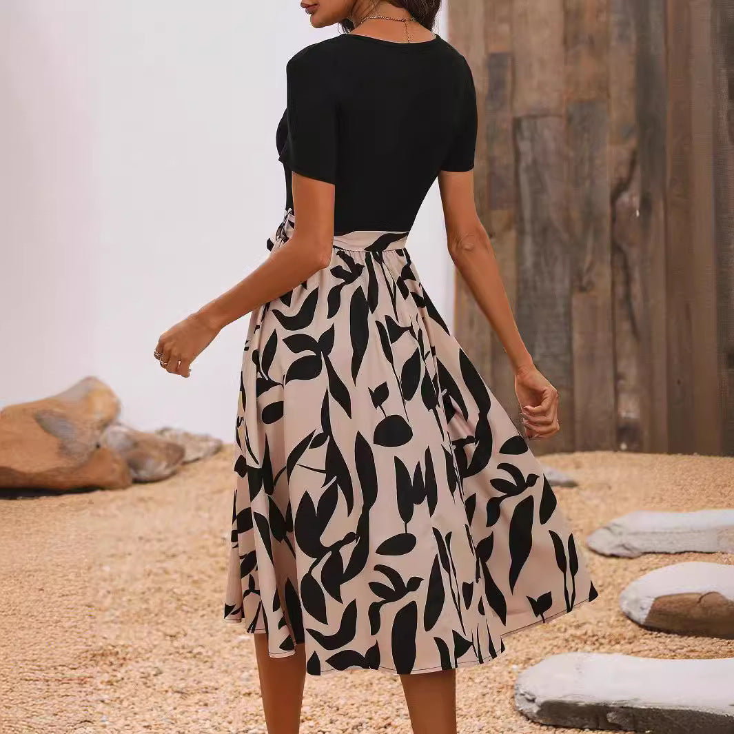 Ladies' fitted midi dress with contrast top, tied waist belt, and flowing A-line skirt Mune Fashion