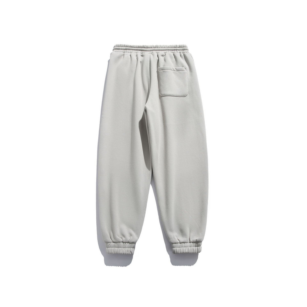 Unisex locker cut fleece jogging pants with drawstring, elastic hem and side pockets Mune Fashion