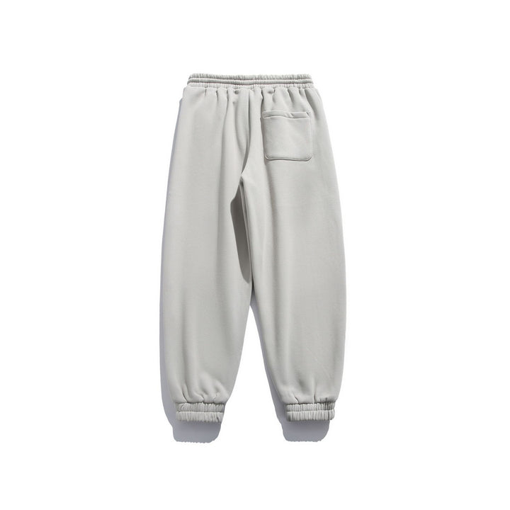 Unisex locker cut fleece jogging pants with drawstring, elastic hem and side pockets Mune Fashion