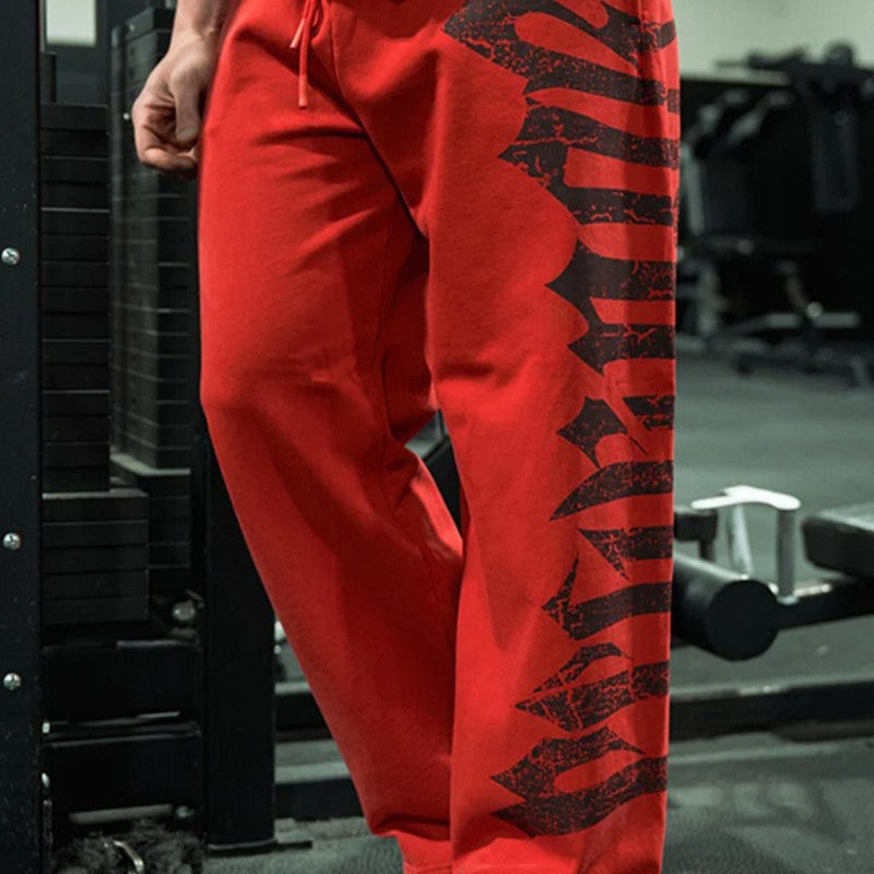 Men's wide sweatpants made of brushed fleece with side vintage print and drawstring waistband Mune Fashion