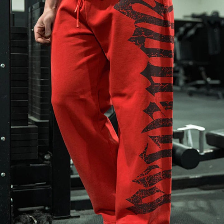 Men's wide sweatpants made of brushed fleece with side vintage print and drawstring waistband Mune Fashion