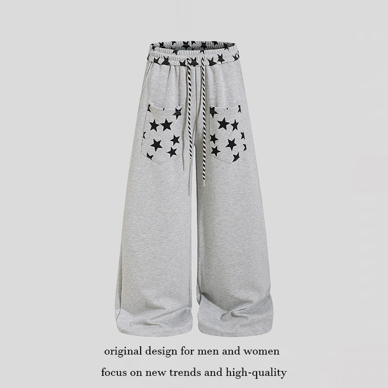 Women's extra wide palazzo sweatpants with comfort waistband, drawstring and star appliqué Mune Fashion
