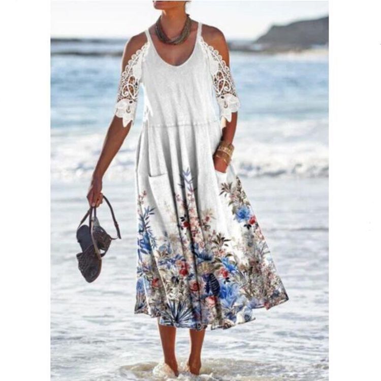 Women’s flowing maxi dress with shoulder cutouts crochet lace sleeves A-line cut and side pockets Mune Fashion