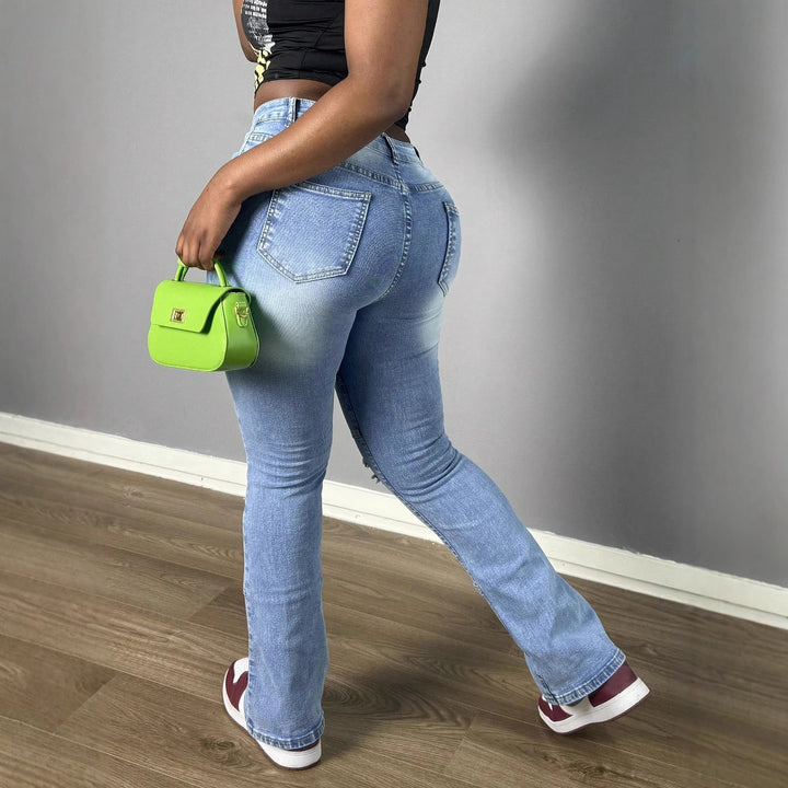 Women High-Waisted Distressed Flared Jeans with Panel Seams Mune Fashion
