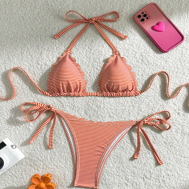 Women's triangle bikini with playful ruffle design and tie straps