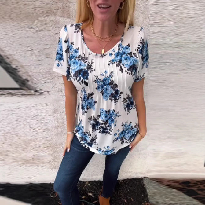 Ladies cropped short sleeve blouse shirt with box pleats and floral print Mune Fashion