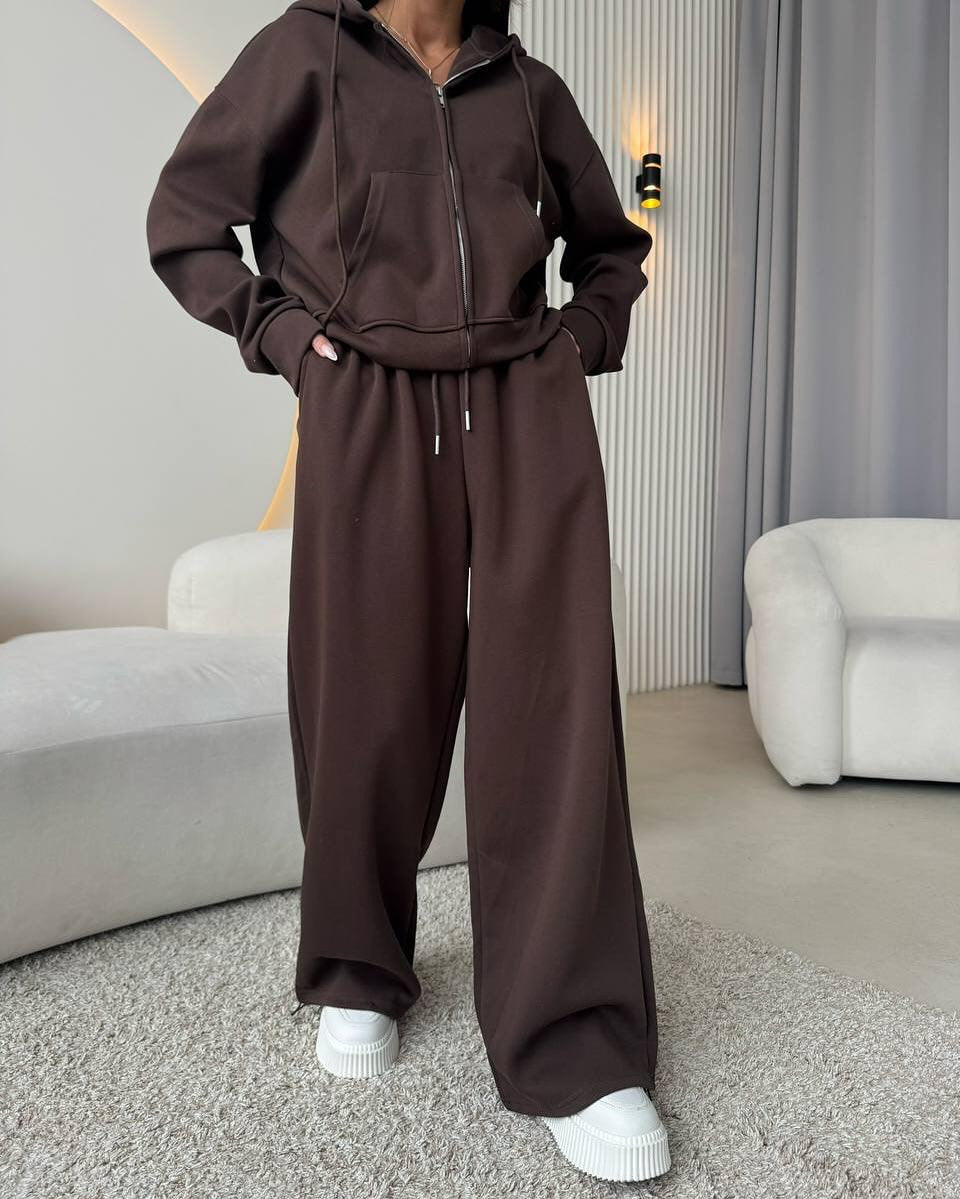 Women's loose high-waist lounge pants made of sweatshirt fabric with drawstring and side pockets Mune Fashion