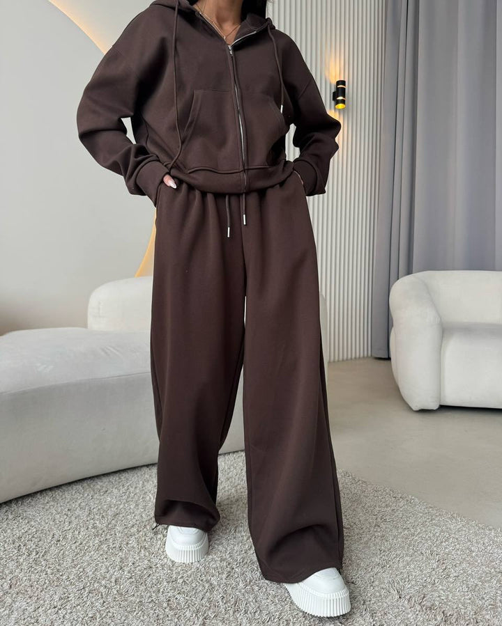 Women's loose high-waist lounge pants made of sweatshirt fabric with drawstring and side pockets Mune Fashion