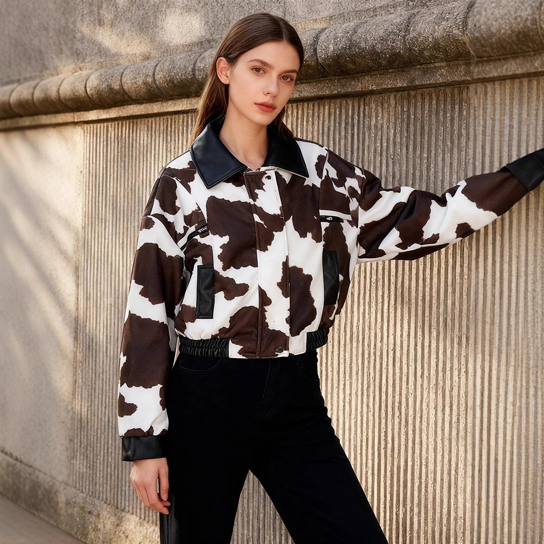 Ladies nan cropped bomber jacket with cow spot pattern and faux leather trim Mune Fashion