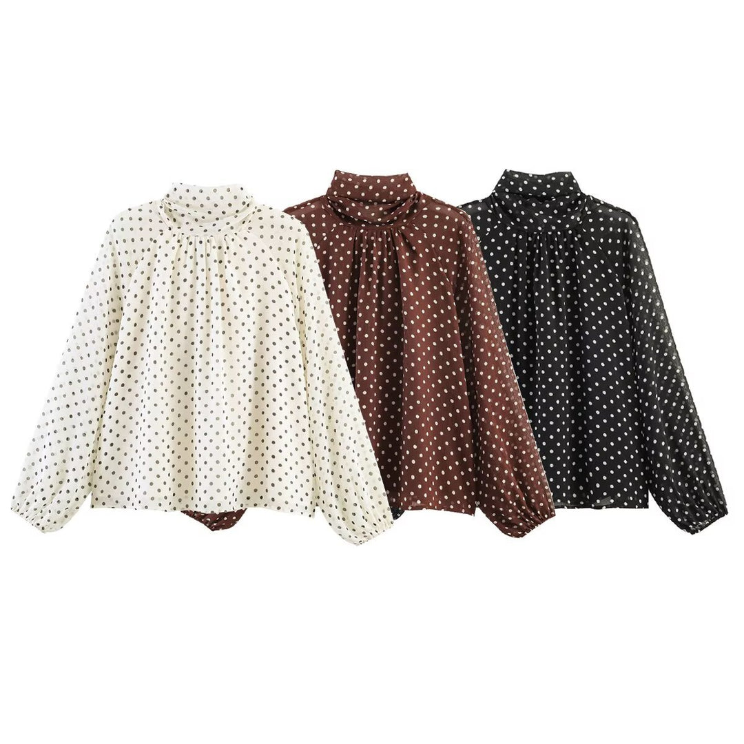 Women's lightweight polka dot blouse with gathered stand collar, frill yoke, and balloon sleeves Mune Fashion