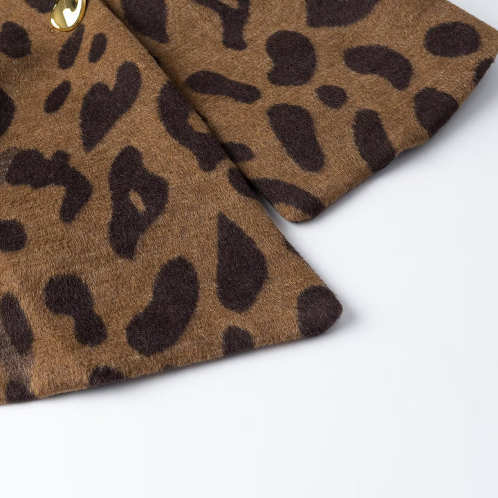 Ladies sleeveless wool blend vest in leopard print with V-neck and decorative button Mune Fashion
