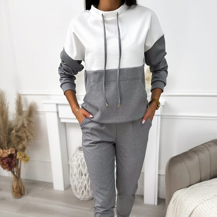 Women's two-piece loungewear set with stand-up collar, kangaroo pocket, and slim joggers Mune Fashion