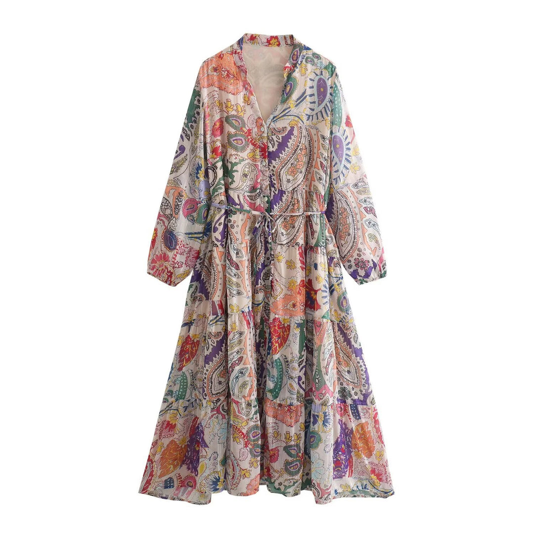 Women’s maxi dress with paisley print, V-neck, waist band and tiered skirt Mune Fashion