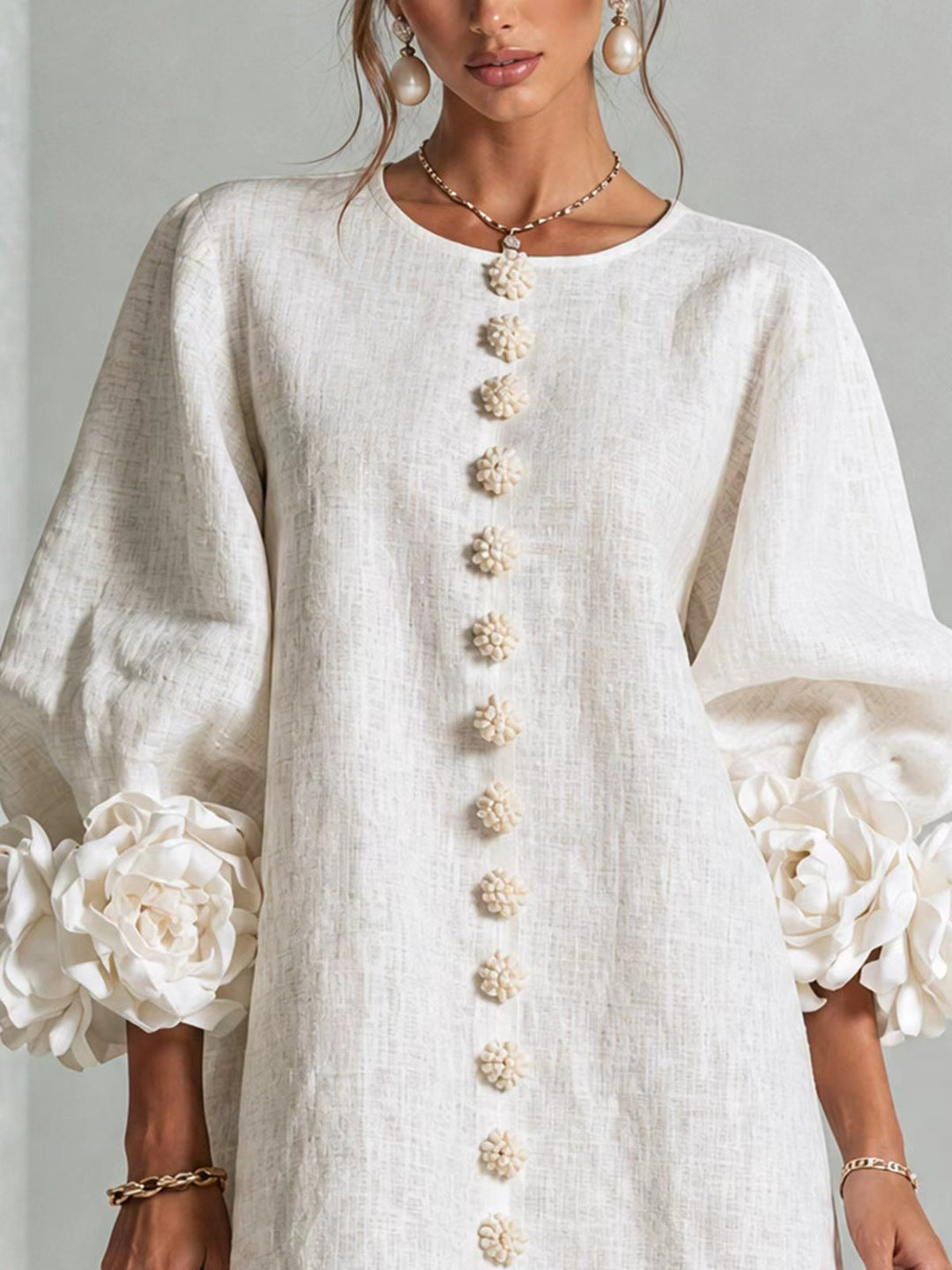 Women’s midi dress with voluminous puff sleeves, 3D flower button placket and linen texture Mune Fashion