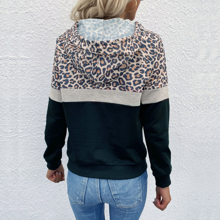 Women's hooded sweatshirt in block design with leopard pattern, kangaroo pocket and drawstring hood