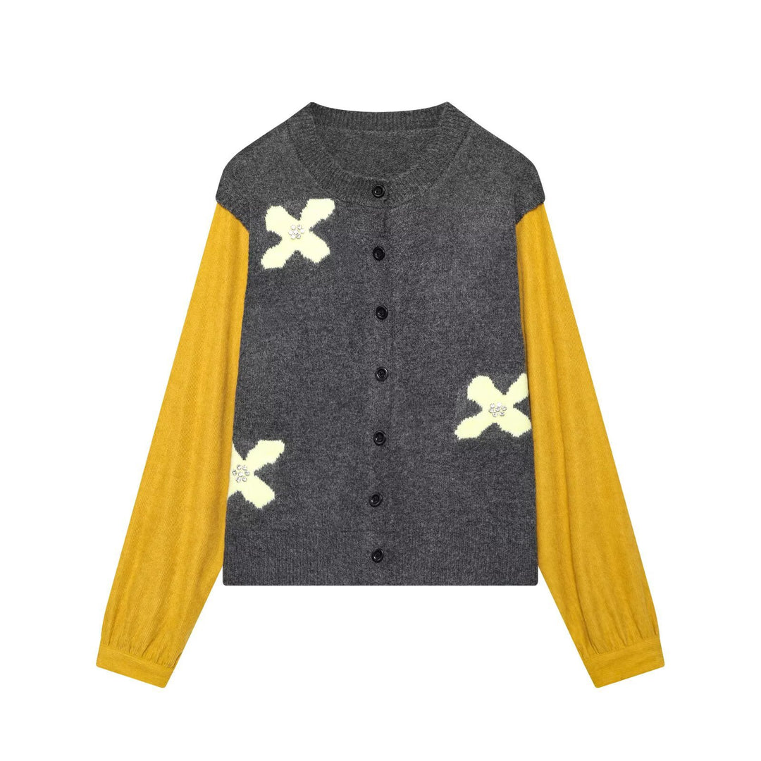Women's knitted cardigan with decorative flower appliqué and contrast sleeves Mune Fashion