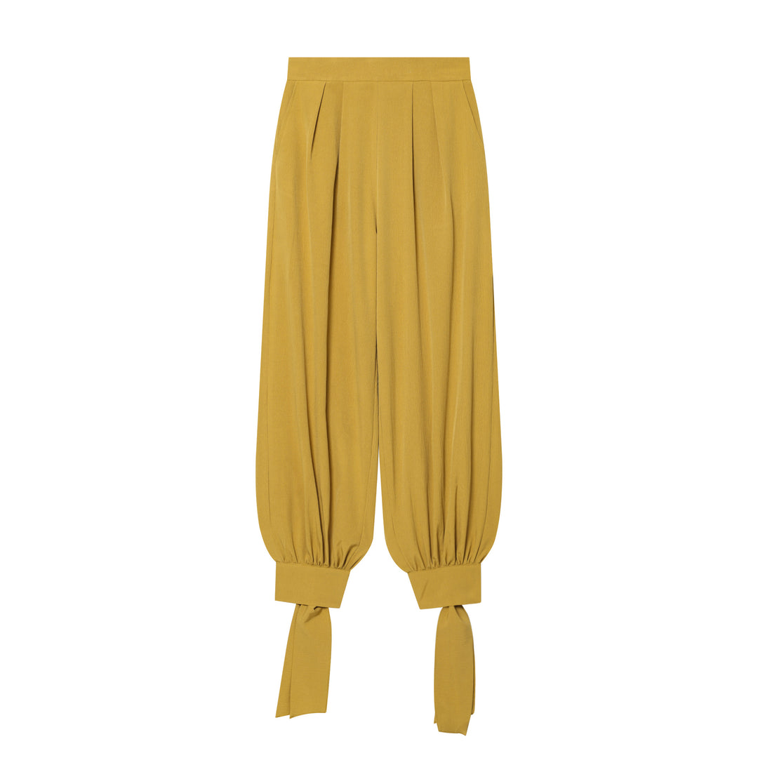 Women’s harem pants with high waistband, pleated folds and knotted cuffs Mune Fashion