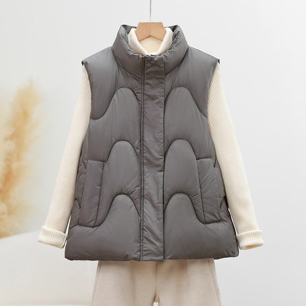 Women's sleeveless quilted vest with high polo collar and ergonomic arc quilting Mune Fashion