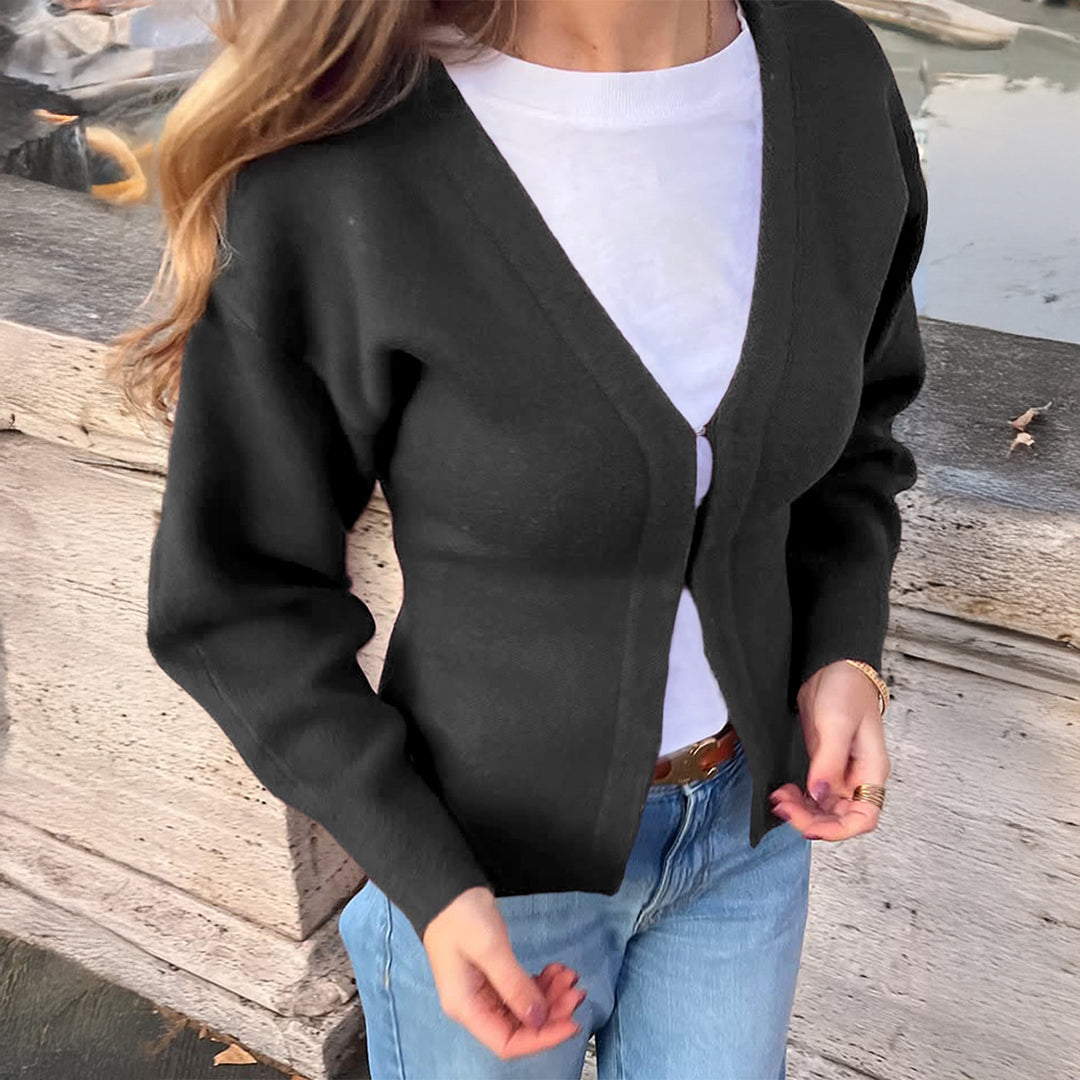 Ladies fitted cardigan with V-neck, puff sleeves and side slits Mune Fashion