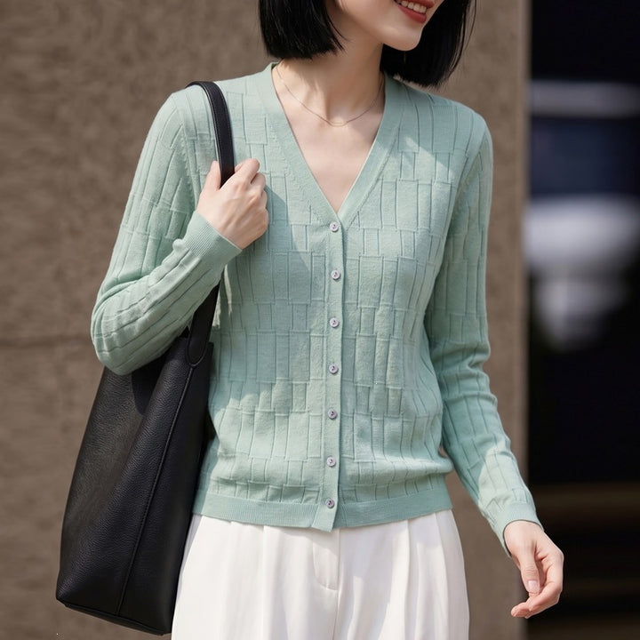 Ladies V-neck fine knit cardigan with structured block design and continuous button placket Mune Fashion