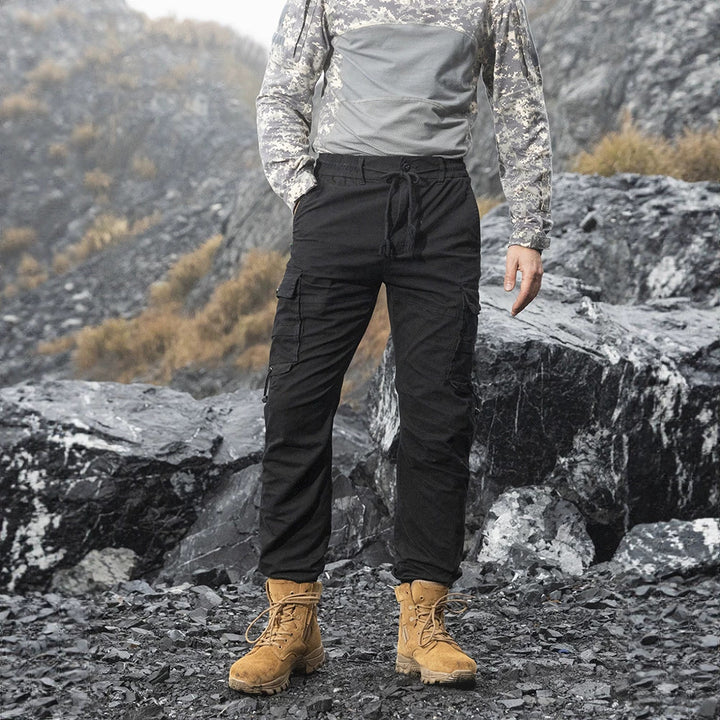 Men's Tactical Utility Cargo Pants in Jogger Cut with Reinforced Knees, Elastic Comfort Waistband and Organizer Pockets Mune Fashion