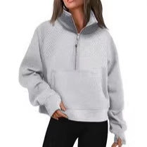 Ladies oversized short pullover with stand-up collar, half zipper and kangaroo pocket Mune Fashion