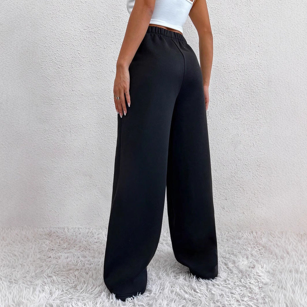 Women's wide lounge pants made of French Terry with high comfort waistband, side insert pockets and flowing legs Mune Fashion