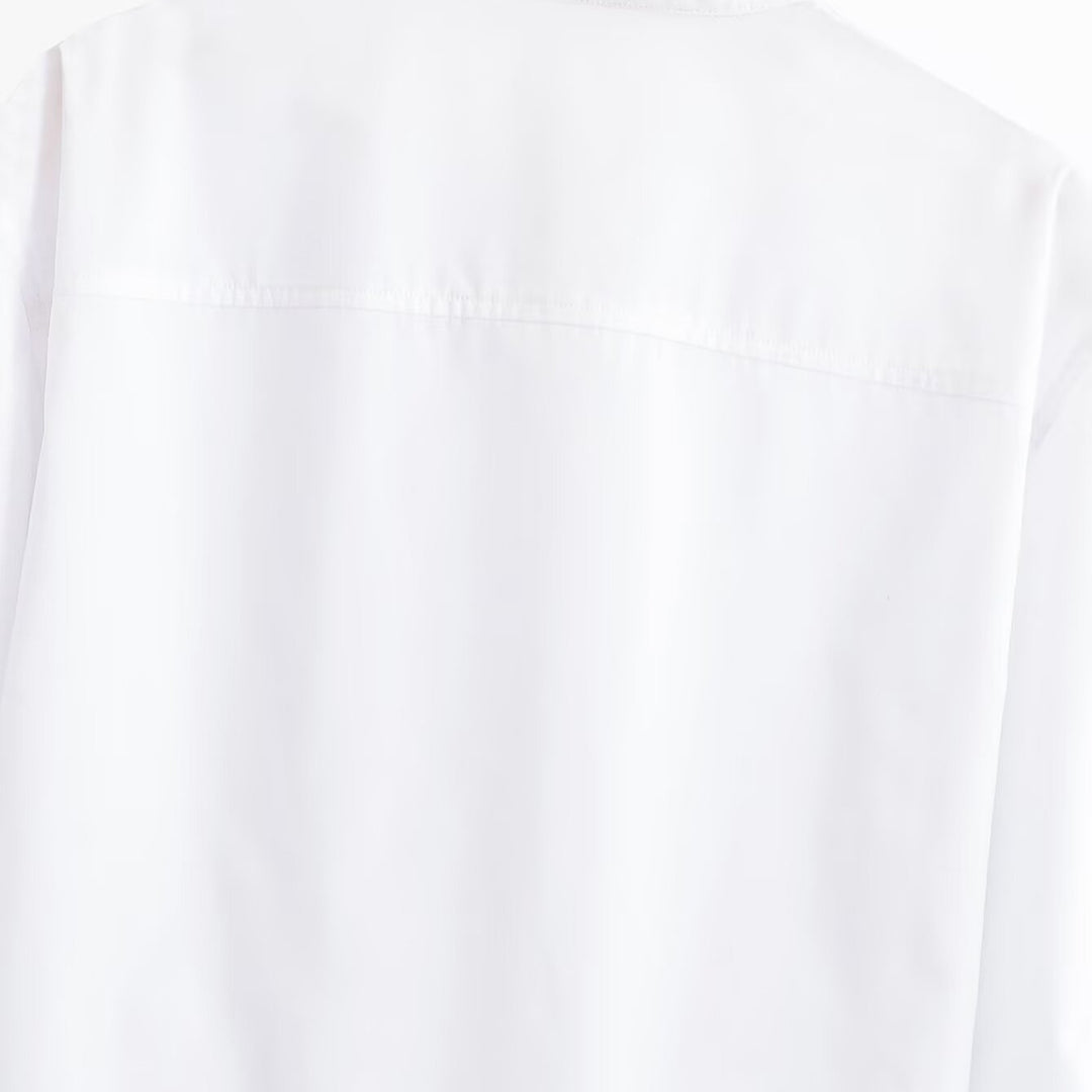 Women's short blouse with stand-up collar, cord corsage at the hem and voluminous sleeves Mune Fashion