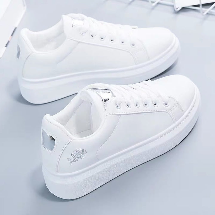 Women's casual urban sneakers with subtle rose embroidery, elevated wedge sole profile and padded comfort insole Mune Fashion